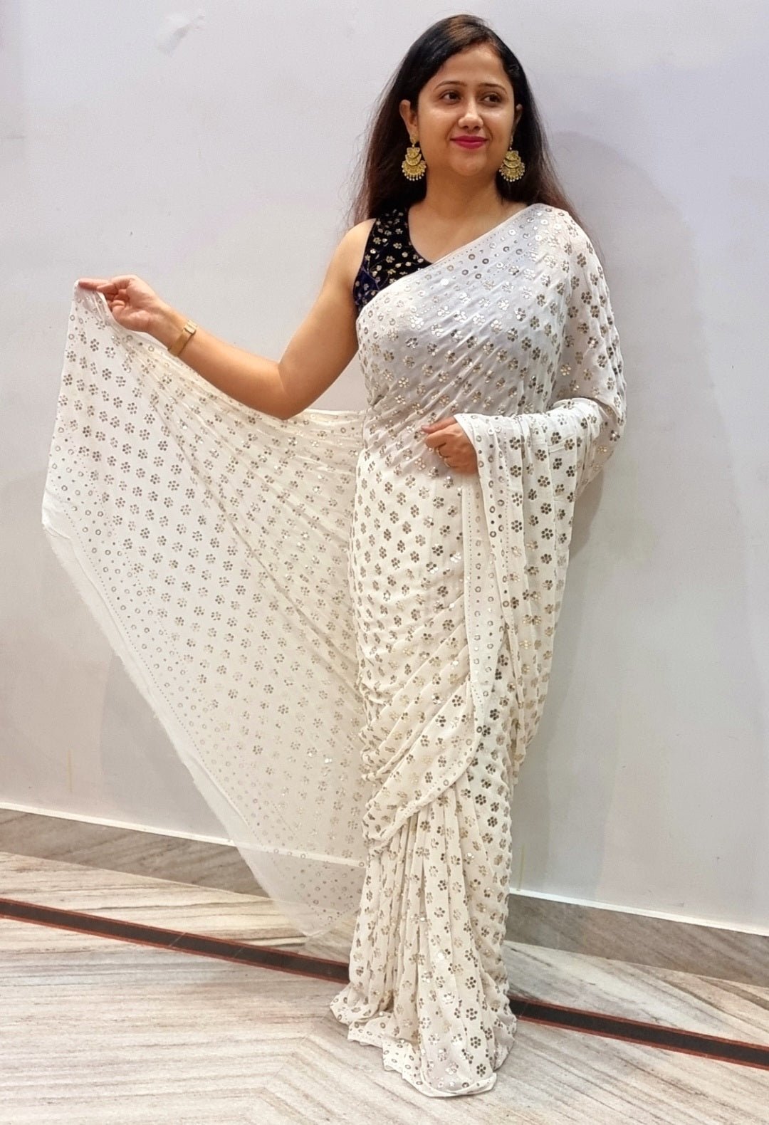 Ivory handcrafted Pure Georgette saree with allover badla and ring mukaish design - NawabiLehaja