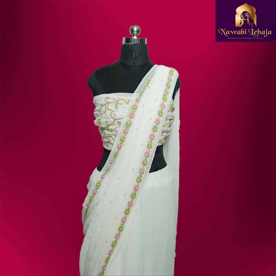 Ivory Pure georgette handcrafted Saree with Pink and green color pearl - NawabiLehaja